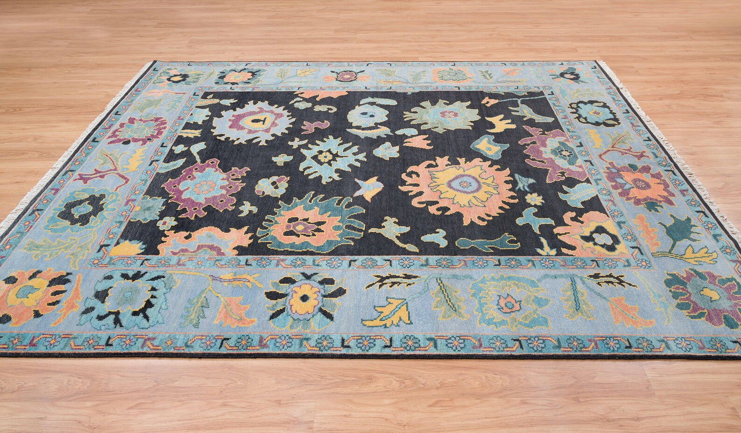 Modern Sky Blue Oushak Rug – Colorful Turkish Wool Area Carpet | Black Base with Orange, Purple & Green Floral Accents