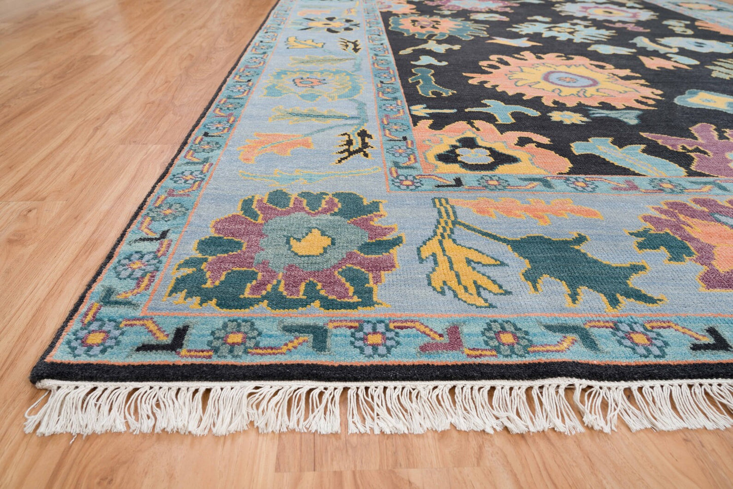 Modern Sky Blue Oushak Rug – Colorful Turkish Wool Area Carpet | Black Base with Orange, Purple & Green Floral Accents