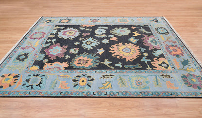 Modern Sky Blue Oushak Rug – Colorful Turkish Wool Area Carpet | Black Base with Orange, Purple & Green Floral Accents