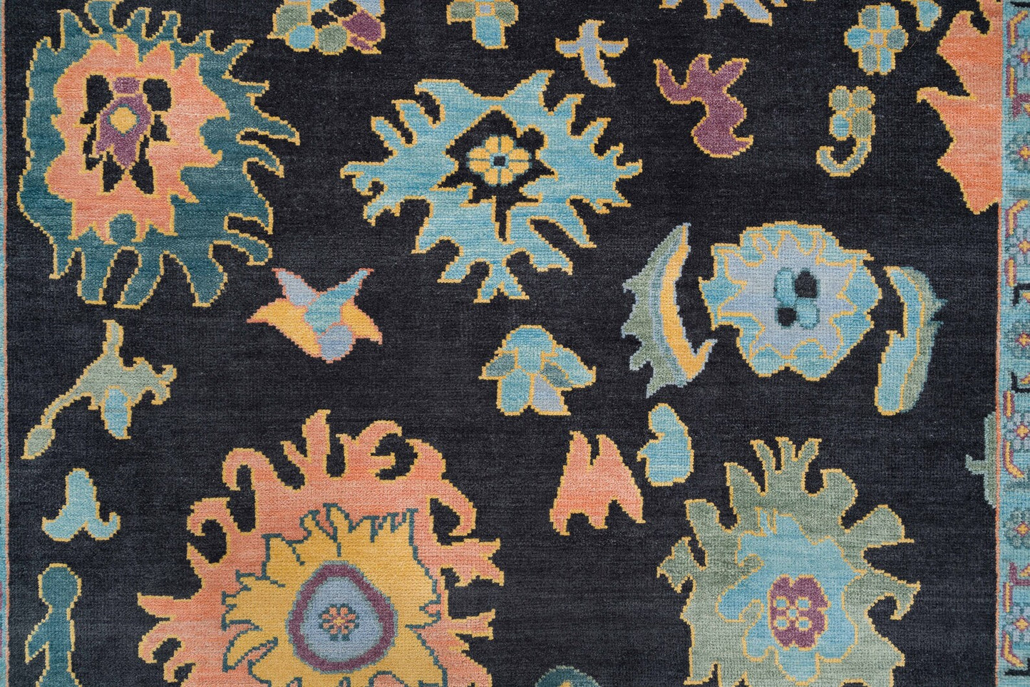 Modern Sky Blue Oushak Rug – Colorful Turkish Wool Area Carpet | Black Base with Orange, Purple & Green Floral Accents