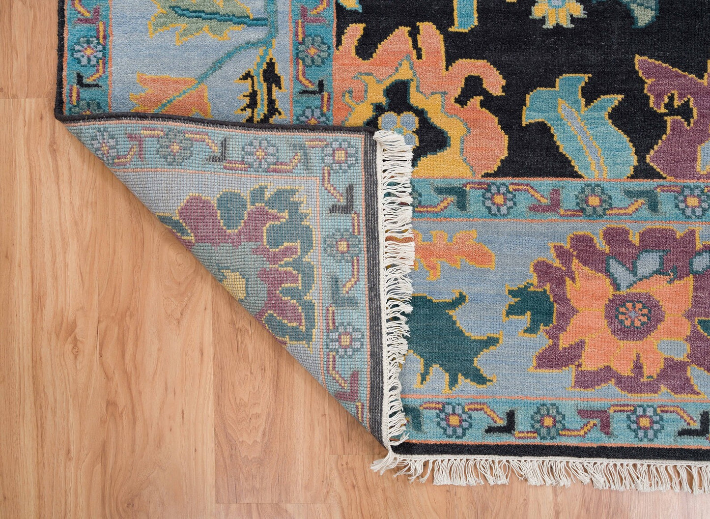 Modern Sky Blue Oushak Rug – Colorful Turkish Wool Area Carpet | Black Base with Orange, Purple & Green Floral Accents