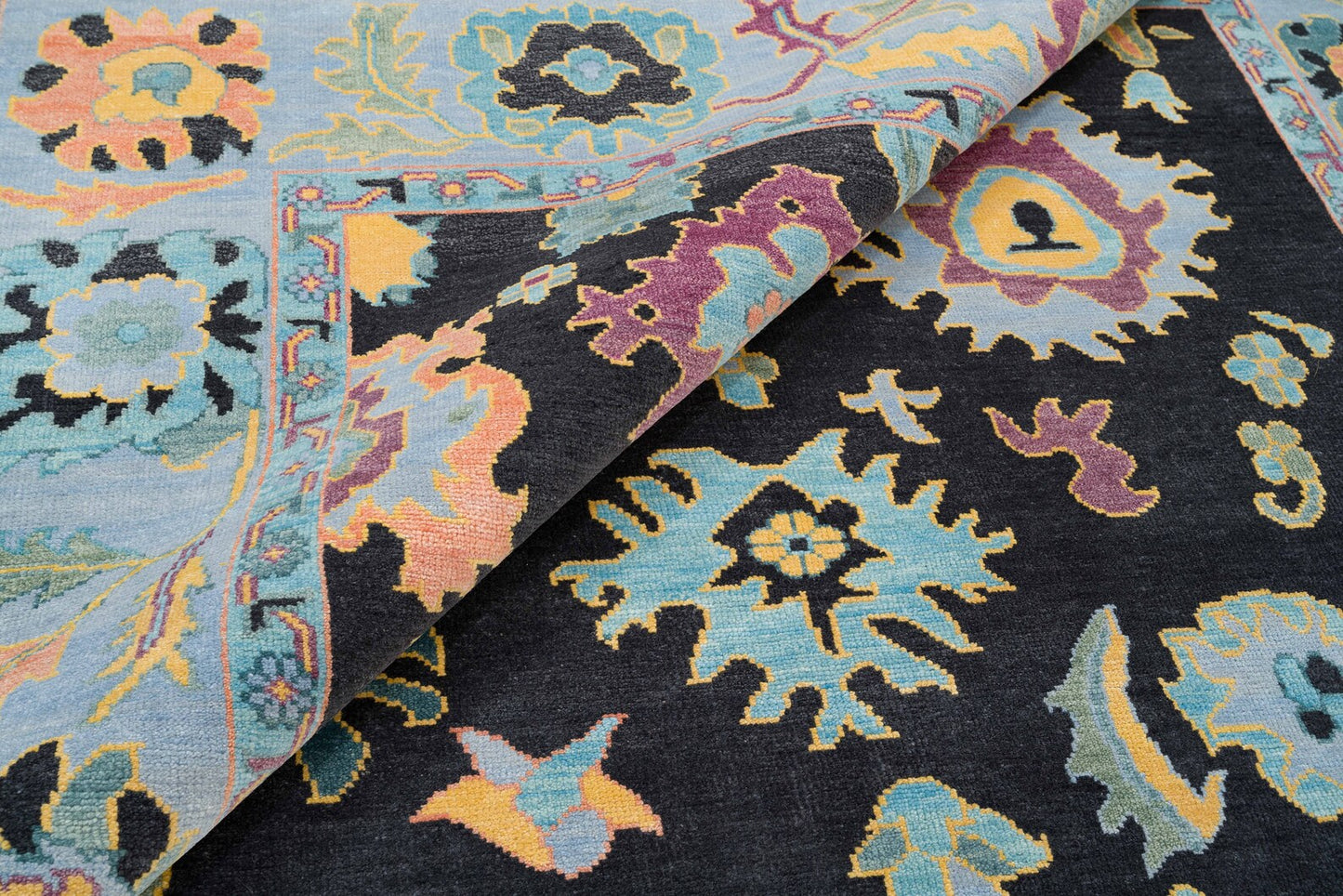 Modern Sky Blue Oushak Rug – Colorful Turkish Wool Area Carpet | Black Base with Orange, Purple & Green Floral Accents