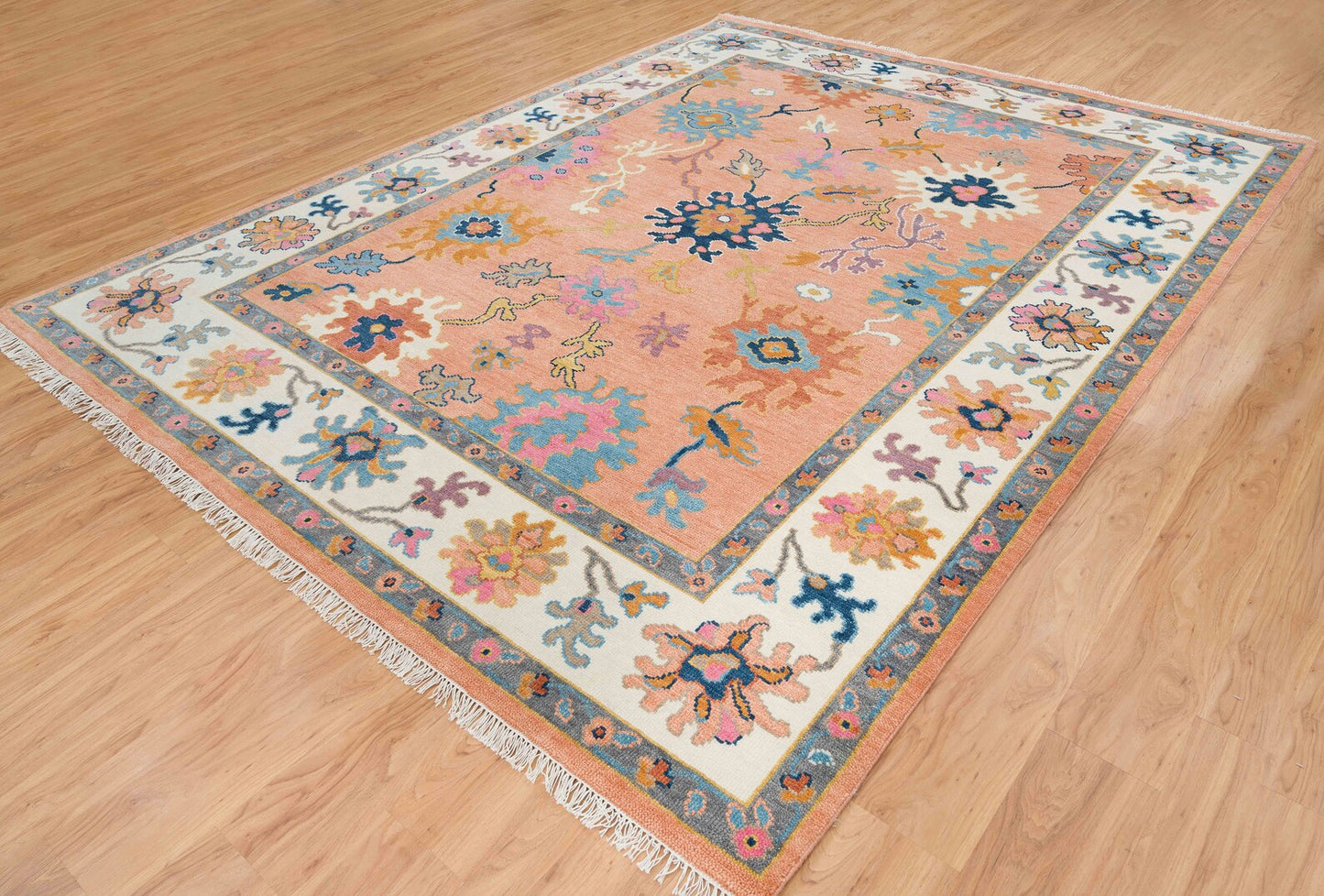 Contemporary Oushak Rug – Light Orange Wool Area Rug with Pink & Blue | Ivory Border Turkish Rug 8x10 / 9x12 for Modern Living Room