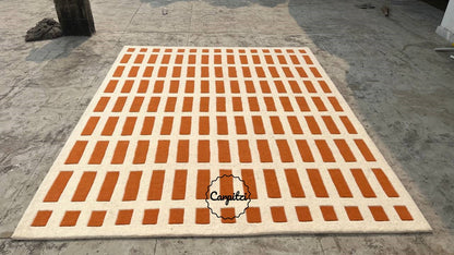 Handmade Modern Grid Rug – Orange & Ivory Wool Area Rug for Living Room | Carpitzi Carpitzi